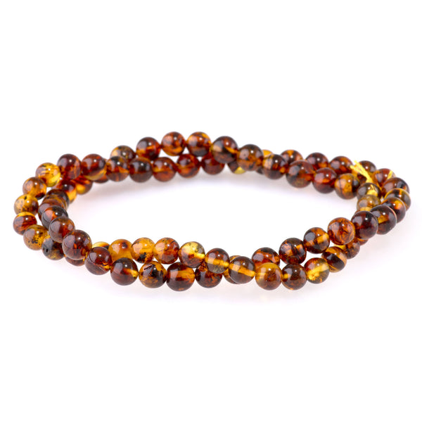 Dendritic Amber 5-6mm Round -15-16 Inch
