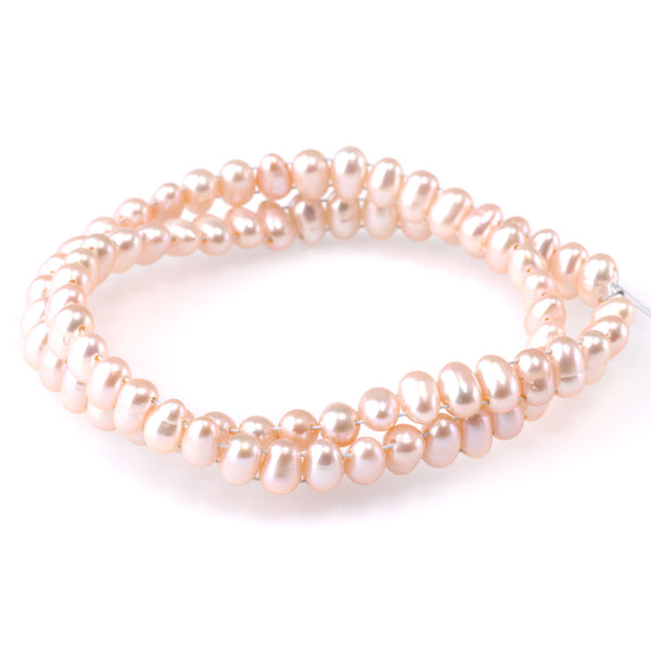 Freshwater Pearl 4x7mm Pink Double Drill Rice Pearls - 15 Inch