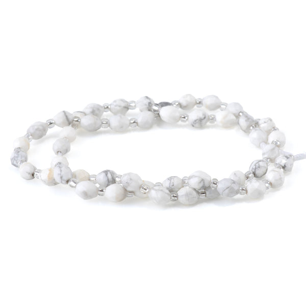 White Howlite 4x6mm Faceted Triangle Cut Rice - 15-16 Inch