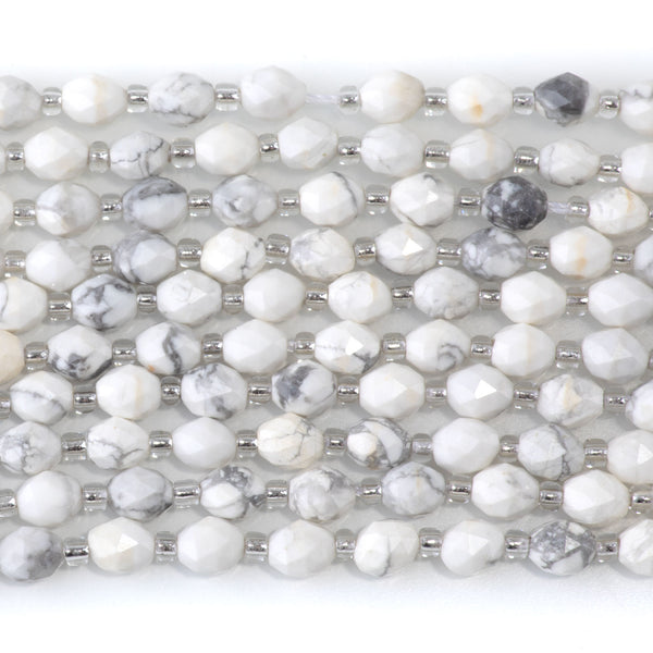 White Howlite 4x6mm Faceted Triangle Cut Rice - 15-16 Inch